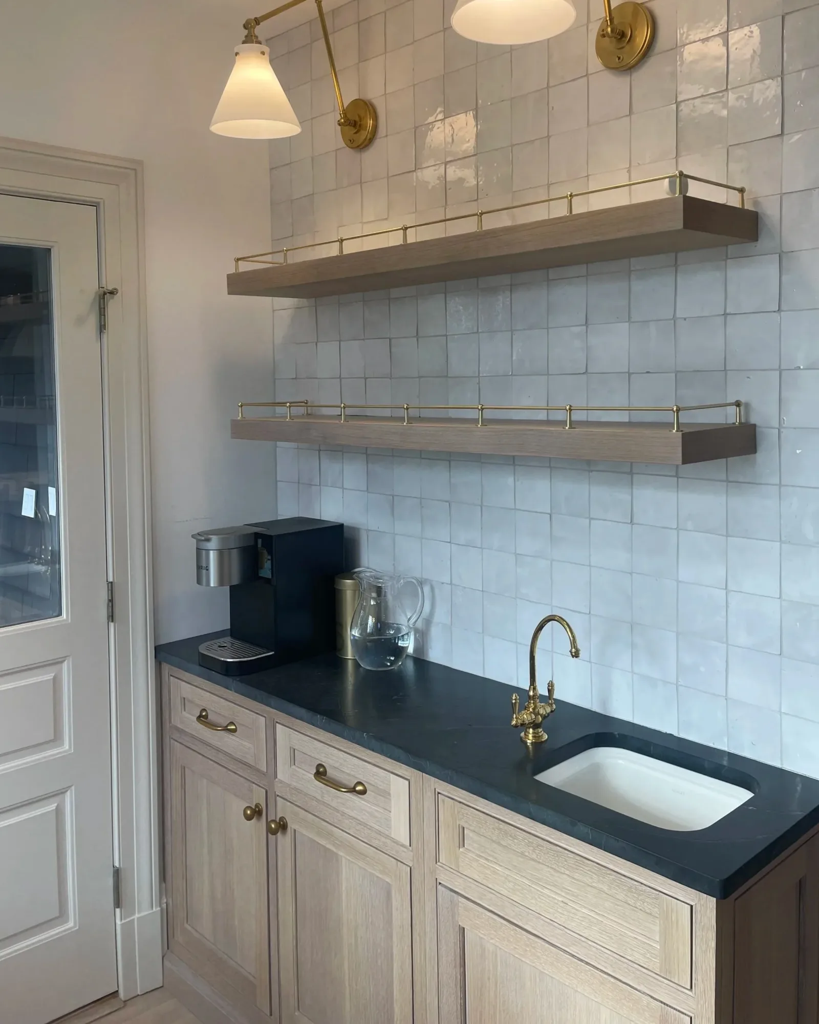 Custom coffee station with zellige tile and floating white-oak shelves