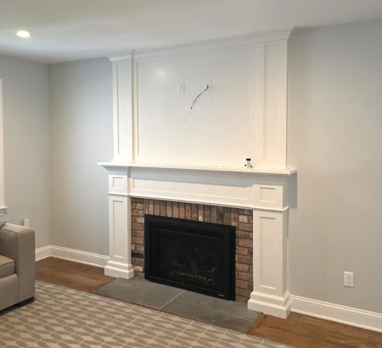 Custom fireplace surround cabinetry by Heard Woodworking — project 4