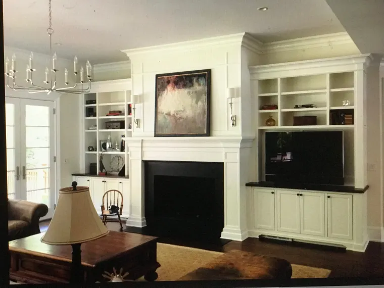 Custom fireplace surround cabinetry by Heard Woodworking — project 8