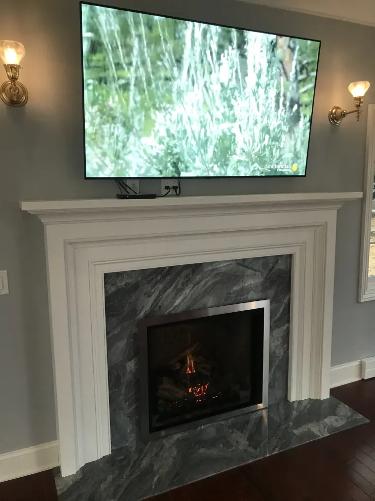 Custom fireplace surround cabinetry by Heard Woodworking — project 12