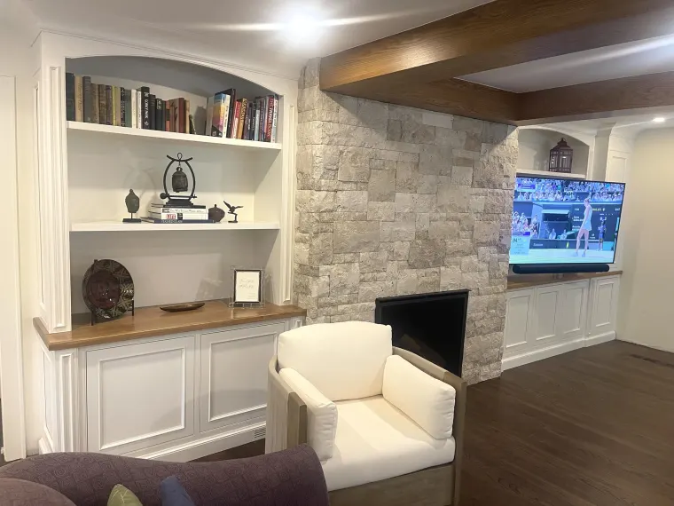 Custom fireplace surround cabinetry by Heard Woodworking — project 13