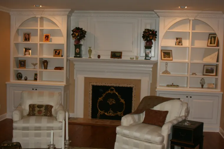 Custom fireplace surround cabinetry by Heard Woodworking — project 14